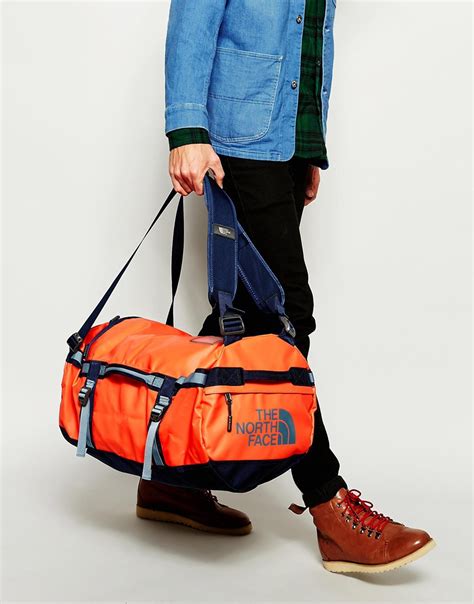 north face carry on bag|north face duffel bag small.